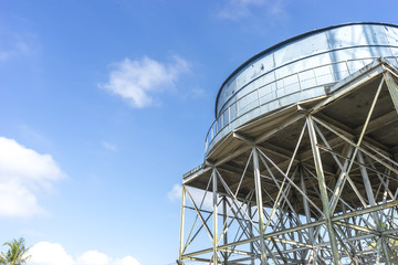 Water reservoir with blue skies