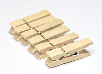 Wooden Cloth Pegs with on White Background.