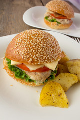 Cheeseburger and potato wedges