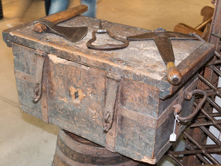 old rural rusty tools above antique wooden box