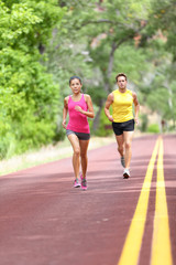 People running on road - Sport and fitness runners