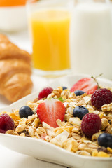 Light, delicious breakfast with cereal and fruit.