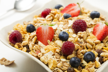 Light, delicious breakfast with cereal and fruit.