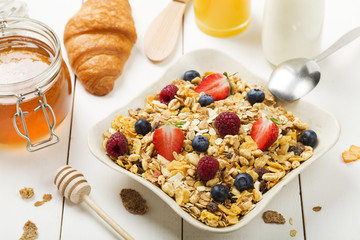 Light, delicious breakfast with cereal and fruit.