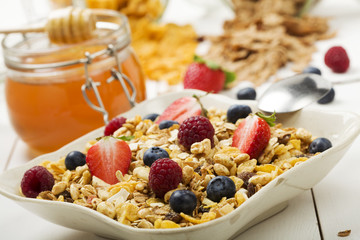 Light, delicious breakfast with cereal and fruit.