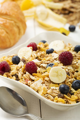 Light, delicious breakfast with cereal and fruit.