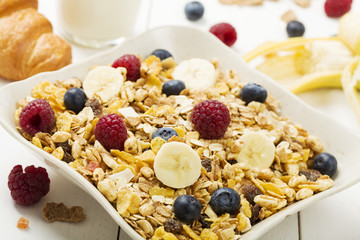Light, delicious breakfast with cereal and fruit.