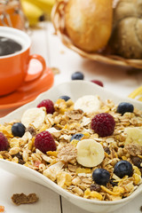 Light, delicious breakfast with cereal and fruit.