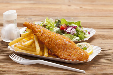 Fried fish and chips on a paper tray