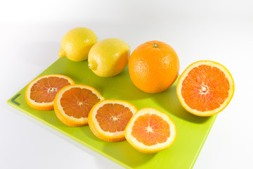 Fototapeta na wymiar Slices Of Oranges And Lemon
