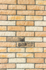 Brick wall of red and orange brick