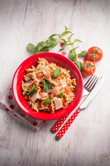 mafalda pasta with tomatoes mint and parmesan cheese flakes