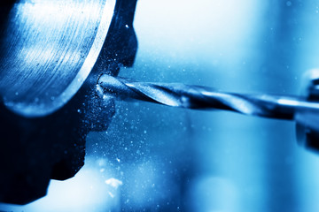 CNC turning, drilling and boring machine at work close-up