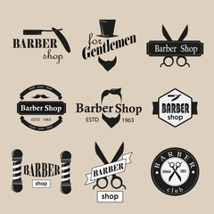 Retro barber shop logotypes set. Vector design elements.