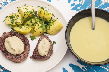 Healthy lunch: asparagus cream and homemade hamburger beef