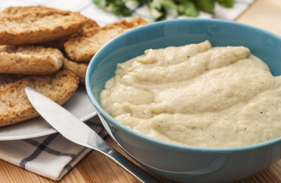 Delicious Snack: Dip Sauce And Toasted Bread