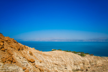 Fototapeta na wymiar Desert Ein Gedi, on the Dead Sea and background Jordan