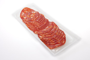 Slices of red chorizo on the package
