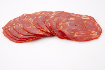 Cut slices of red iberian chorizo