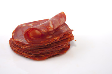 Cut slices of red iberian chorizo
