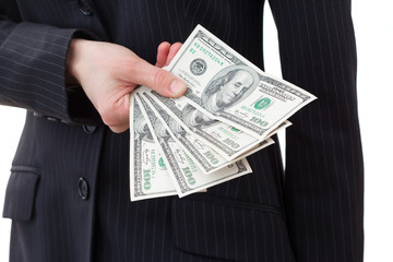 Businesswoman holding dollars close-up