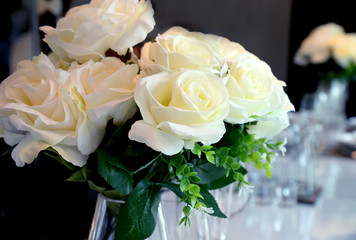 White roses in a glass vase