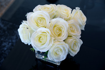 White roses in a glass vase