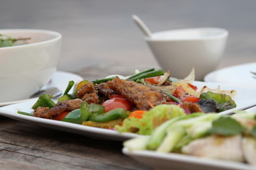 Thai food, spicy stir fried ffish with paprika.