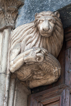 Statue of a Lion holding a Lamb at Monza Cathedral
