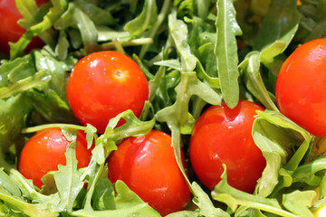 Fresh vegetable salad: rocket and сherry tomato