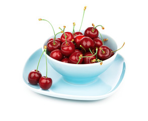 Obraz na płótnie Canvas Bowl full of cherries isolated on white background