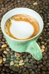 Hot shot of espresso macchiato