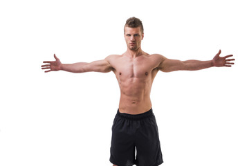 Young muscle man shirtless with arms spread open