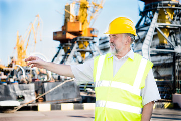 Engineer at a construction site in the port