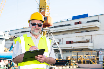 Engineer at a construction site in the port