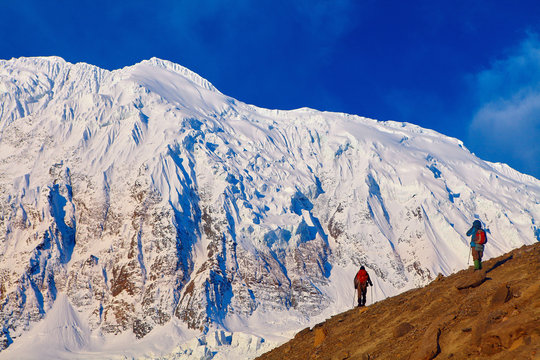 climbers at the top of a pass