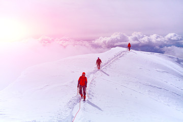 hiker at the top of a pass