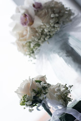 White wedding bouquet in glass mug