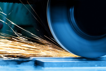 Sparks from grinding machine. Industrial, industry - obrazy, fototapety, plakaty