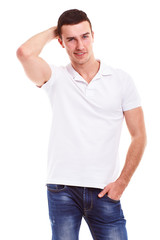 Fototapeta premium Young happy man in a white polo shirt