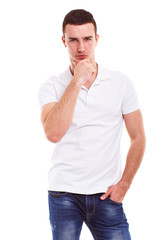 Pensive man in a white polo shirt