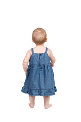 Portrait of a little girl in dress behind