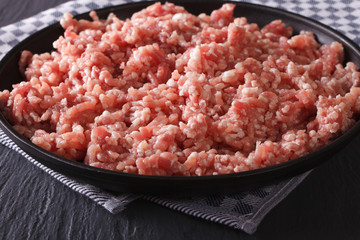 Raw pork minced close up horizontal
