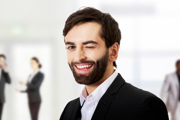 Young smiling business man.