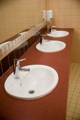 Three of wash basin in the rest room