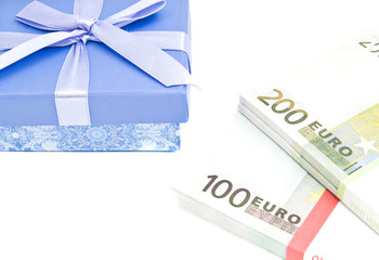 banknotes and blue gift box