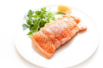 Salmon and shrimps pocket raw on white plate