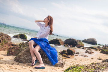 A girl looks to the sky.