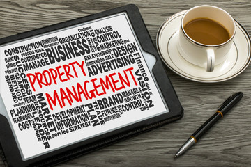 property management with related word cloud handwritten on table