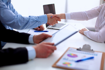Business people shaking hands, finishing up a meeting